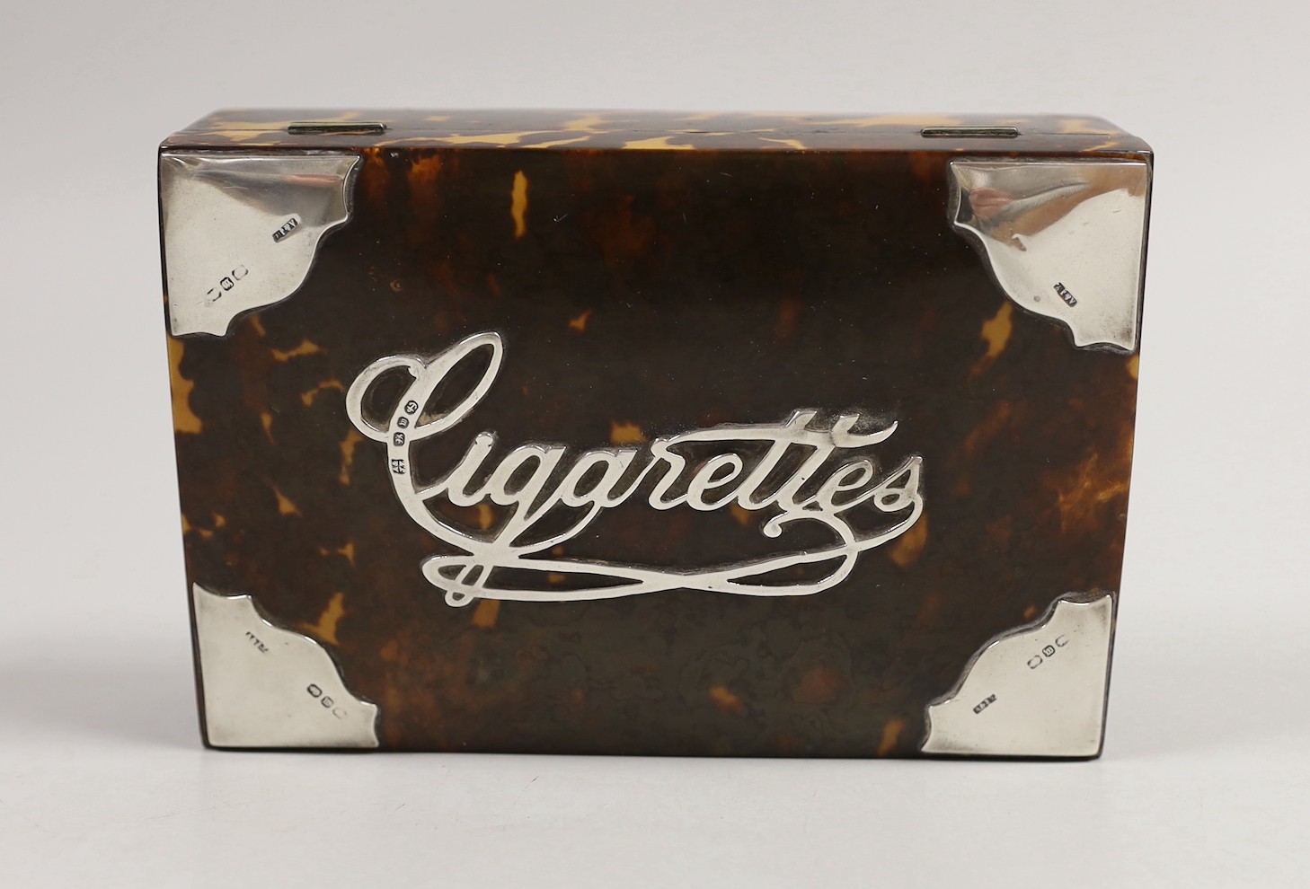 A late Victorian silver mounted tortoiseshell rectangular 'Cigarettes' box, A & J Zimmerman, Birmingham, 1896, 15.2cm.